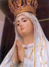 Mary of Fatima hands folded in prayer